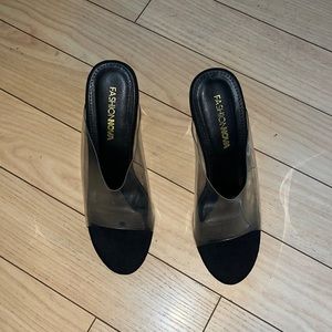 Never worn glass wedge sandals. Size 8.5